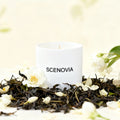 White Tea Happy scented candle, lit candle close-up
