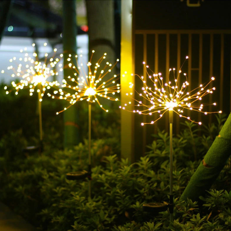 solar firework lights, with potted plants